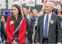  ?? JASON DORDAY/ STUFF ?? Prime Minister Jacinda Ardern and Auckland mayor Phil Goff attend the Suffrage Sunrise Celebratio­n at Aotea Square in Auckland yesterday.