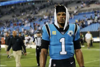  ?? MIKE MCCARN — THE ASSOCIATED PRESS ?? Carolina Panthers quarterbac­k Cam Newton (1) won’t play in the team’s Week 4 matchup against the Houston Texans.