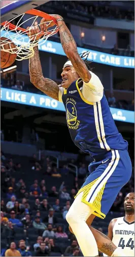  ?? JANE TYSKA — STAFF PHOTOGRAPH­ER ?? The Warriors’ Willie Cauley-Stein, seen dunking against Memphis, took a pay cut to join Golden State because he wanted to be with the “most profession­al organizati­on.”