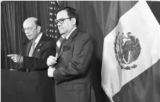  ?? — AFP photo ?? This file photo shows US Commerce Secretary Wilbur Ross (left) speaks during a joint press conference with Mexico’s Minister of Economy Ildefonso Guajardo Villarreal at the Commerce Department in Washington, DC. Ross on June 5, said his team is near to...