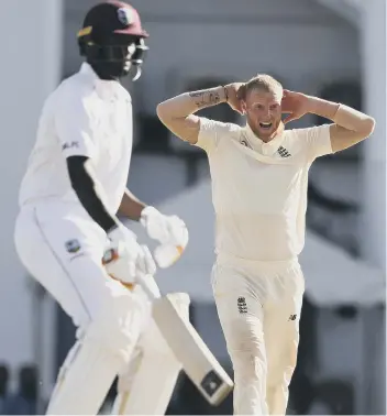  ??  ?? England’s Ben Stokes reacts as West Indies’ captain Jason Holder scores runs yesterday.
