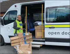  ??  ?? Rudy Montejo, Manager at Open Door, loading up essential PPE to be delivered.