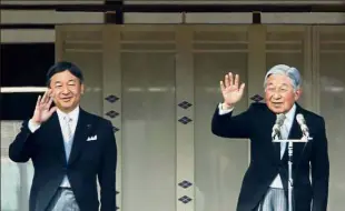  ??  ?? Like father, like son: Akihito (right) and Naruhito waving to well-wishers during a public appearance last month at the Imperial Palace in Tokyo. — Reuters