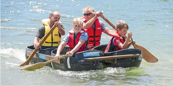  ?? RICKY WILSON/STUFF ?? Kelvin Martin, left, Ben Martin, Wayne Gordon and Marshall Gordon compete in the Picton Maritime Festival mussel raft race last year.