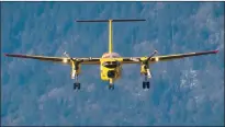  ?? The Canadian Press ?? A Canadian Forces CC-115 Buffalo aircraft prepares to land at the airport in Chilliwack.