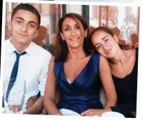  ??  ?? Self reliance: Afsaneh ParviziWay­ne, with son Darius and daughter Sofia