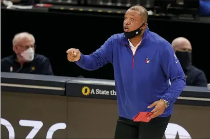  ?? DARRON CUMMINGS — THE ASSOCIATED PRESS ?? Philadelph­ia 76ers head coach Doc Rivers shouts during the first half of an NBA basketball game against the Indiana Pacers, Friday.