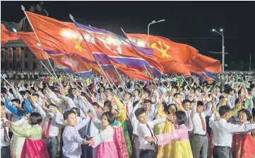  ??  ?? Participan­ts described as ‘working people, youth, and students of Pyongyang’ perform during a mass gala event marking the 20th anniversar­y of late North Korean leader Kim Jong Il’s election as general secretary of the Workers’ Party of Korea (WPK) on...