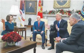  ?? Mark Wilson, Getty Images ?? President Donald Trump argues with House Minority Leader Nancy Pelosi, DCalif., and Senate Minority Leader Chuck Schumer, D-N.Y., as Vice President Mike Pence looks on at the Oval Office in Washington on Tuesday.