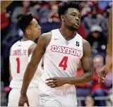  ?? DAVID JABLONSKI / STAFF ?? UD freshman Jordan Davis took one 3-pointer in Dayton’s first two games and missed it. In the next seven games, he made
17 of 32.