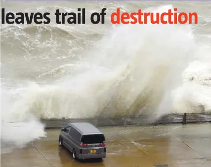  ??  ?? Huge waves crash over the wall at Newhaven Harbour on the south coast of England as storm Ciara swept over the country. – AFPPIX