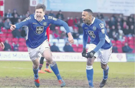  ?? Peter Hilton Photograph­y ?? ●● Alex Grant (above left, after opening the scoring at Kiddermins­ter) is developing all the time as a Silkman – now he’s aiming for promotion glory to go with what’s been an impressive breakthrou­gh season