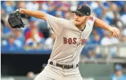  ?? ED ZURGA/GETTY IMAGES ?? Boston’s Chris Sale beat Kansas City to run his record to 9-3. Sale allowed four hits and fanned 10 to push his total to 146.