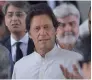  ?? AFP ?? Pakistan Tehreek-i-Insaf chief Imran Khan leaves the Supreme Court after attending the hearing. —