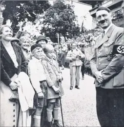  ?? Picture: C&T Auctioneer­s and Valuers ?? Hitler poses with children