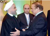  ?? APP ?? Prime Minister Sharif meets President of Iran Hassan Rohani at the ECO Summit in Islamabad on Wednesday. —