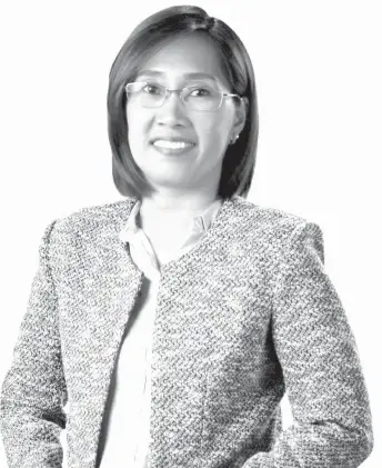  ??  ?? Carolyn Ocampo Medel, top real estate agent of Santos Land Developmen­t Corp.
