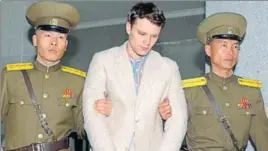  ?? REUTERS FILE ?? Otto Frederick Warmbier (centre) being taken to North Korea's top court in Pyongyang.