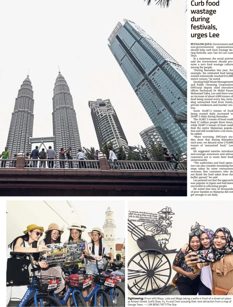  ??  ?? Sightseein­g: (From left) Maya, Laila and Mega taking a wefie in front of a street art piece at Acheen Street. (Left) Zhao, Yu, Fu and Chen scouting their next attraction from a map of George Town. — LIM BENG TATT/ The Star