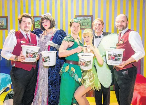  ?? Picture: Artur Lesniak ?? Pantomime stars with Theatre Royal ushers, from left: Jack Cottrell; Rebecca Wheatley; Tim Edwards; Rachel Grundy; Paul Nicholas ; and John Gould pictured at the theatre after announcing that collection­s from pantomime goers had raised over £4,000 for four charities