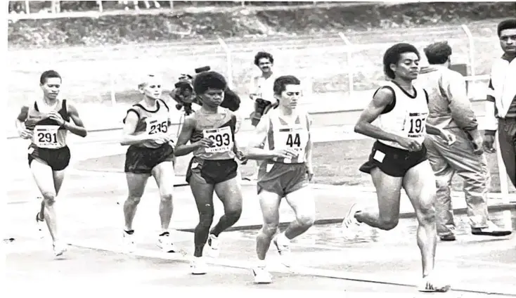  ?? Photo: FASANOC ?? Salome Tabuatalei (right) leads one of the women’s long distance events during the South Pacific Games.