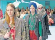  ??  ?? Last winter, a Gucci model walked the runway wearing a turban.