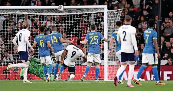  ?? Pictures: Mike Hewitt/Getty ?? England’s Ollie Watkins fires over the crossbar in Saturday night’s game against Brazil at Wembley
