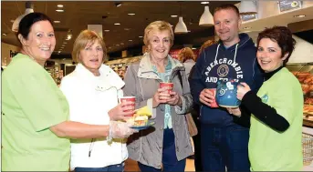  ?? Cooper Galvin Photo by Michelle ?? Michelle Jones with Joan Knott, Sarah Kelly Tobin, Cllr Damien Quigg and Colette Boyle enjoying the 25th Anniversar­y Hospice Coffee Morning in Jones Eurospar, Killorglin, on Thursday.
