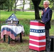  ??  ?? Rensselaer County Legislator Mark Fleming, a lifelong friend of the family of U.S. Navy Petty Officer Francis Brown, speaks during a ceremony Thursday in Troy’s Prospect Park marking the 50th anniversar­y of Brown’s death in an attack on the USS Liberty...