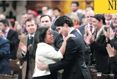  ?? JUSTIN TANG / THE CANADIAN PRESS ?? Prime Minister Justin Trudeau is embraced by Justice Minister Jody Wilson-Raybould after delivering a speech Wednesday on the recognitio­n and implementa­tion of Indigenous rights.