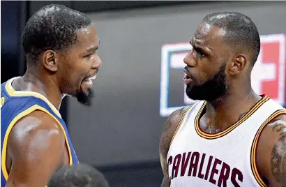  ?? AFP ?? Superstars LeBron James and Kevin Durant exchanged heated words as Golden State and Cleveland clashed in game four. —