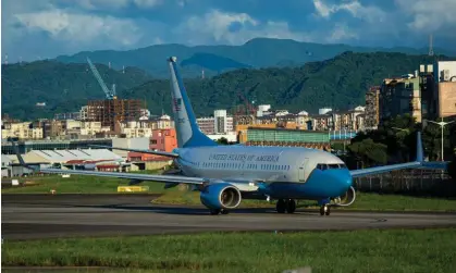  ?? Photograph: Annabelle Chih/Getty Images ?? A US airforce plane carrying Nancy Pelosi leaves Taipei on Wednesday.