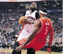  ?? FRANK GUNN/THE CANADIAN PRESS ?? The Raptors’ Amir Johnson, left, has left the Raptors after six seasons to sign a deal with the Boston Celtics.