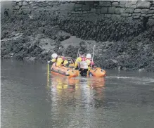  ??  ?? Police divers recovered the man from the river.