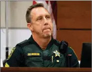  ?? (AP/South Florida Sun-Sentinel/Mike Stocker) ?? Broward County sheriff’s Sgt. Richard Van Der Eems describes the scene he encountere­d when he entered Marjory Stoneman Douglas High School soon after the shooting began.