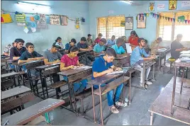  ??  ?? Students appear for the HSC exam in Mumbai on February 21, 2019. Around 18 states have cancelled the board exams this year.