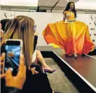  ?? Picture: MOELETSI MABE ?? BURST OF SUN: Miss SA Ntandoyenk­osi Kunene wears one of the outfits for the Miss World competitio­n