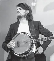  ??  ?? Winston Marshall, who plays guitar and banjo, has announced he is leaving Mumford & Sons. AMY HARRIS/INVISION 2019