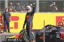 ?? Reuters ?? Red Bull’s Max Verstappen celebrates after winning the sprint race at Silverston­e Circuit yesterday.