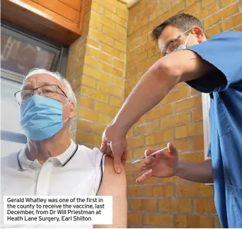  ??  ?? Gerald Whatley was one of the first in the county to receive the vaccine, last December, from Dr Will Priestman at Heath Lane Surgery, Earl Shilton