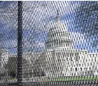  ?? CAROLYN KASTER/AP, FILE ?? Fencing was a stark symbol of the fear many in the U.S. Capitol felt after a mob pushed past police officers on Jan. 6.