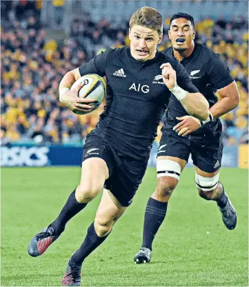  ??  ?? Command performanc­e: Beauden Barrett goes over for a try in Sydney; the All Blacks fly-half also kicked 12 points