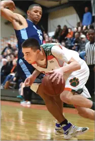  ??  ?? RECORDER PHOTO BY CHIEKO HARA Portervill­e High School’s C.J. Fish drives in.