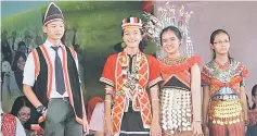  ??  ?? Four students in traditiona­l Bidayuh and Iban outfits during the event.