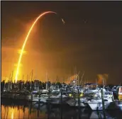  ?? MALCOLM DENEMARK/FLORIDA TODAY VIA AP ?? This long-exposure photo shows the launch of a SpaceX Falcon 9 rocket on a resupply mission for NASA to the Internatio­nal Space Station from Pad 39A at Kennedy Space Center.