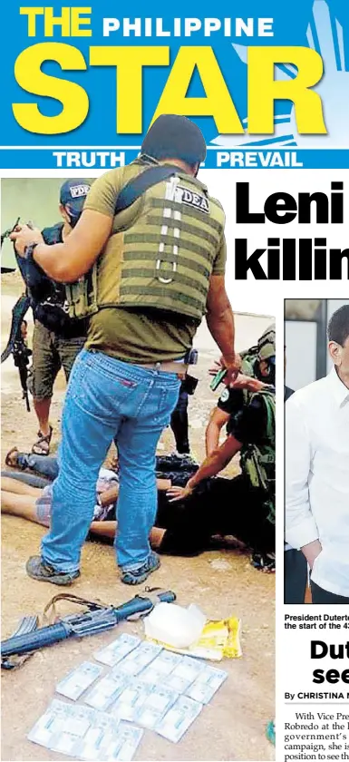  ?? JOHN UNSON ?? Two suspected drug dealers lie on the ground after they were arrested by PDEA-BARMM agents in Shariff Aguak, Maguindana­o yesterday. Story on Page 15.