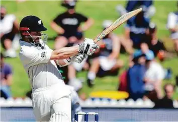  ?? AFP ?? New Zealand’s captain Kane Williamson pulls the ball en route to his unbeaten century during day five of the first Test against Bangladesh at the Basin Reserve in Wellington yesterday.