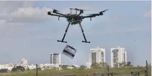  ?? (Marc Israel Sellem/The Jerusalem Post) ?? YESTERDAY’S DRONE delivery over Hadera.