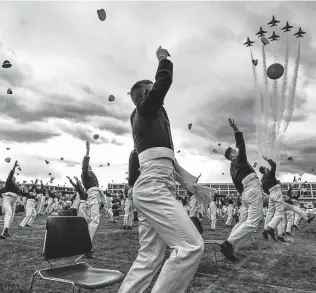  ?? Getty Images file photo ?? U.S. Air Force Academy cadets celebrate their graduation in 2020. One day, these grads will celebrate their 20-year reunion and reflect on the twists and turns of life.