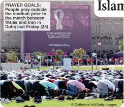  ?? © Catherine Ivill/Getty Images ?? PRAYER GOALS: People pray outside the stadium prior to the match between Wales and Iran in Doha last Friday (25)